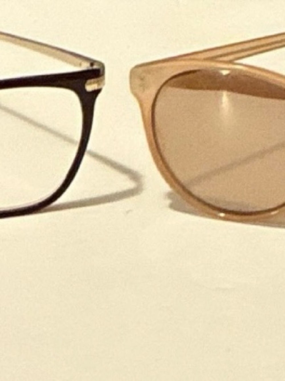 Two Pairs of Sunglasses - Black and Light Brown Frames
